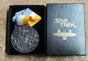 Star Trek commemorative medal in box.