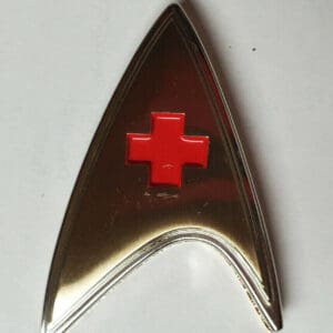 Star Trek medical badge with red cross.