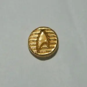 Gold coin with starfleet insignia.