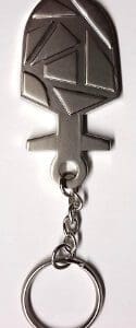 Silver anchor keychain with geometric design.