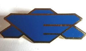Blue hand-shaped pin with gold outline.