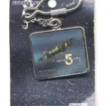 Babylon 5 keychain with a spaceship image.