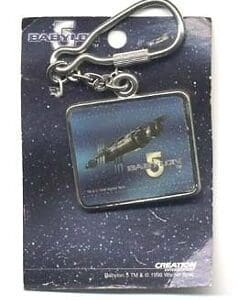 Babylon 5 keychain with a spaceship image.