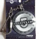 Babylon 5 silver keychain on card.