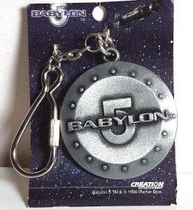 Babylon 5 silver keychain on card.