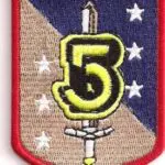 Military patch with a sword and the number 5.