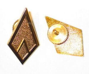 Gold diamond-shaped pin with back view.