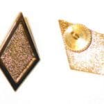 Gold diamond shaped pin with a back pin.