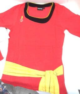 Red long-sleeved shirt with yellow sash.