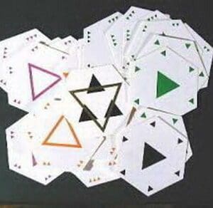 A stack of hexagonal cards with triangles.