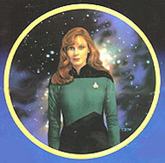 Woman in Starfleet uniform against a starry background.