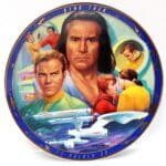 Star Trek commemorative plate with characters and ship.