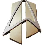 Gold and silver Starfleet emblem.