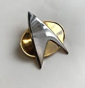 Star Trek silver and gold pin.