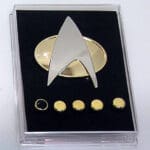 Star Trek insignia display with pins.