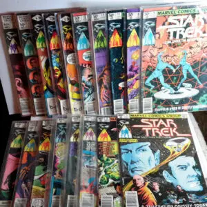 Star Trek comic books in plastic sleeves.