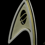 Gold Starfleet insignia with black background.