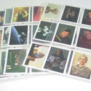 Star Trek trading cards in plastic sleeves.