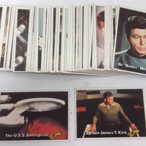 Star Trek trading cards featuring Kirk, Spock, and McCoy.