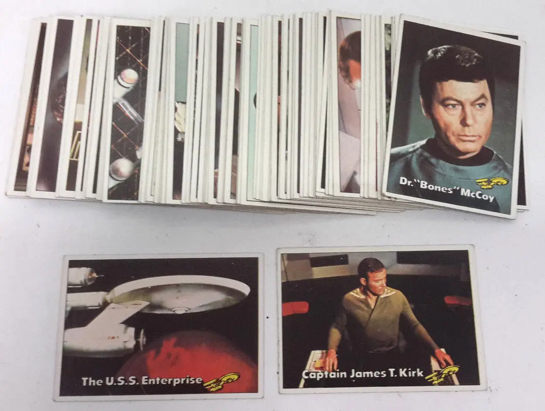 Star Trek trading cards featuring Kirk, Spock, and McCoy.