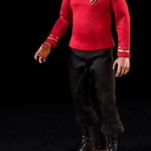 Star Trek action figure in red shirt.