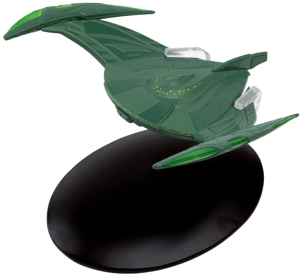 Green model of the USS Voyager starship.