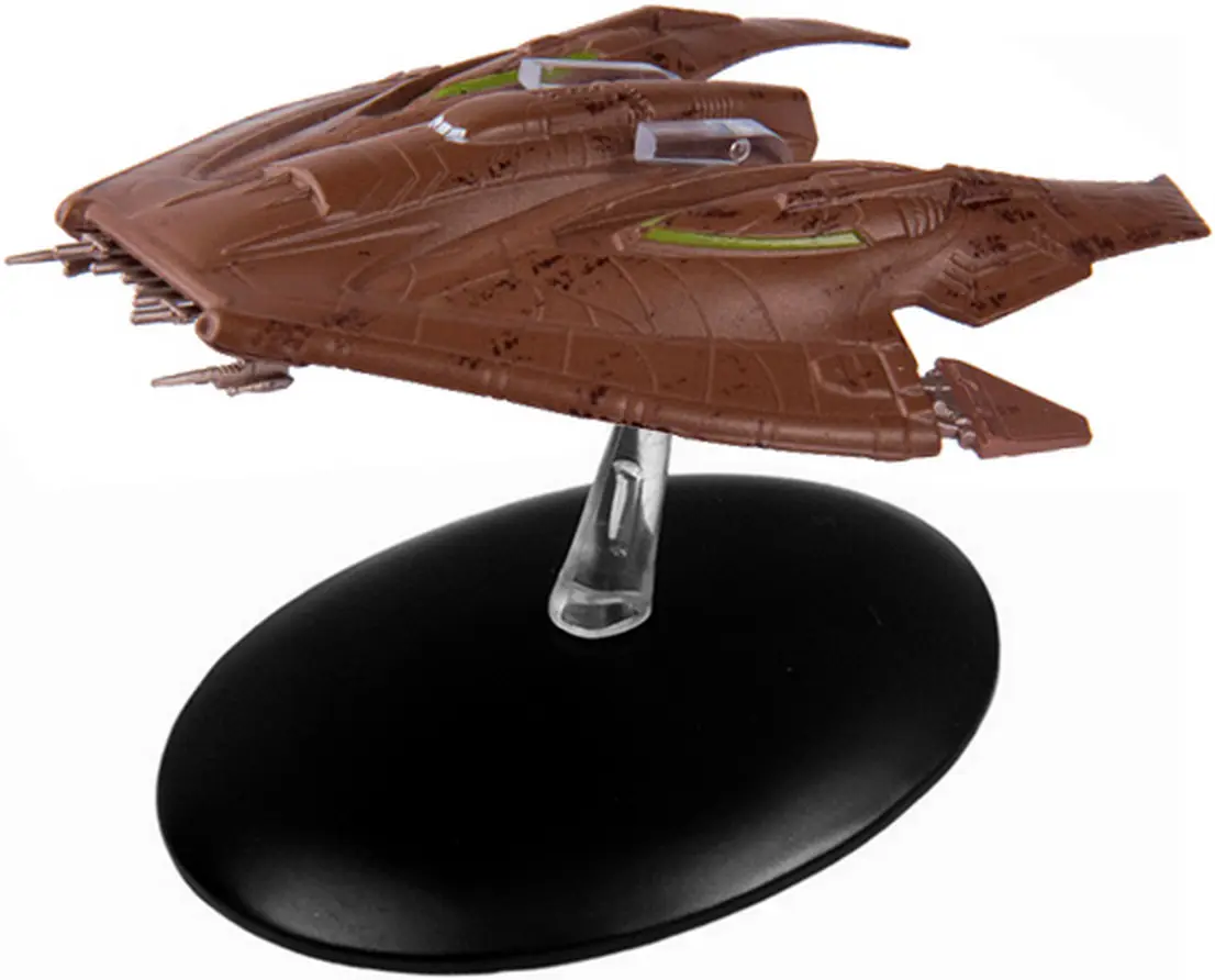 Brown and green Starfleet vessel on a stand.