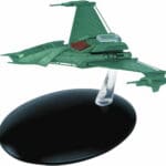 Green Bird-of-Prey starship on display stand.