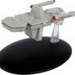 Star Trek USS Voyager model on stand.