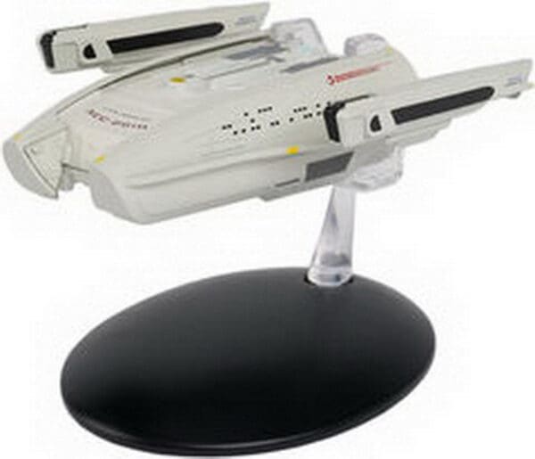 Star Trek Voyager starship model on stand.