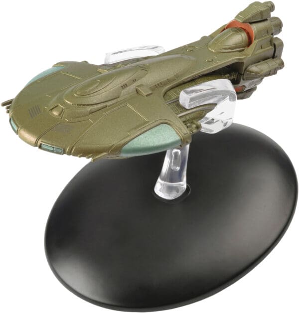 Gold model of a Jem'Hadar attack ship.