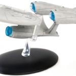 Star Trek Enterprise model on a stand.