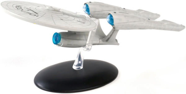 Star Trek Enterprise model on a stand.