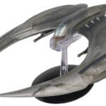 A gray and silver model of a spaceship.