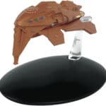 A brown model of a Starfleet ship.