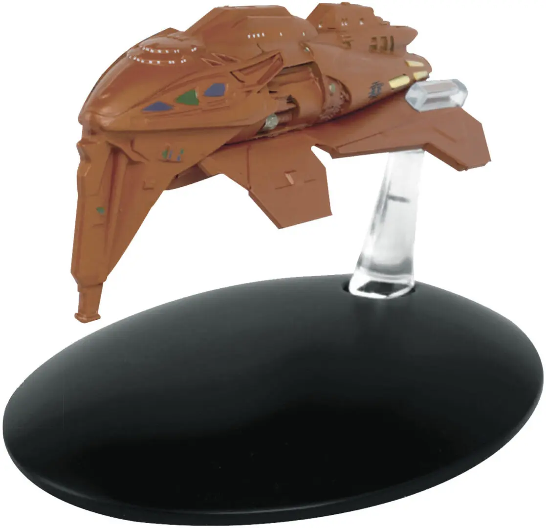 A brown model of a Starfleet ship.