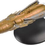 Gold painted model of a starship.