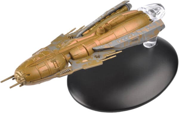 Gold painted model of a starship.