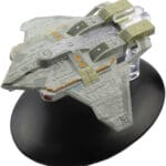 A grey and white Starfleet shuttle model.