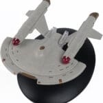 Star Trek Voyager model on display stand.