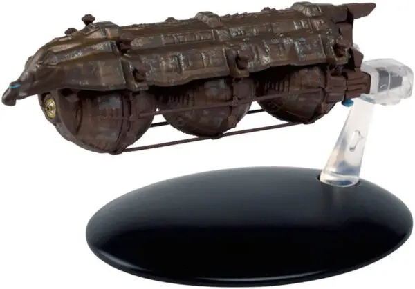 A weathered, rusted, model spaceship.