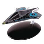 Black and blue starship model on a stand.