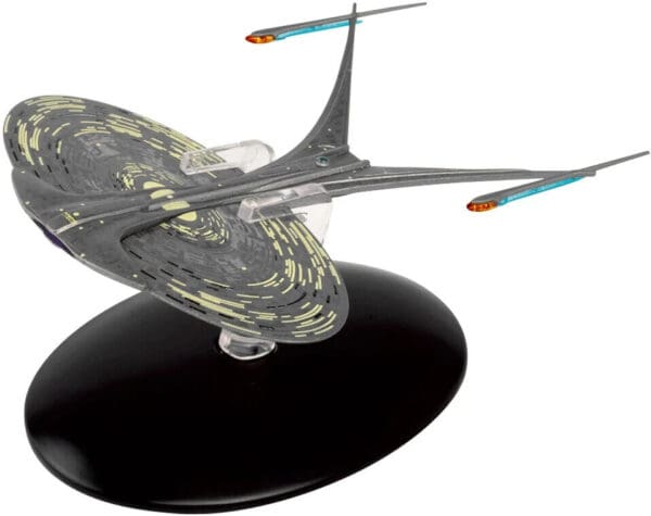 Star Trek Voyager starship model on base.