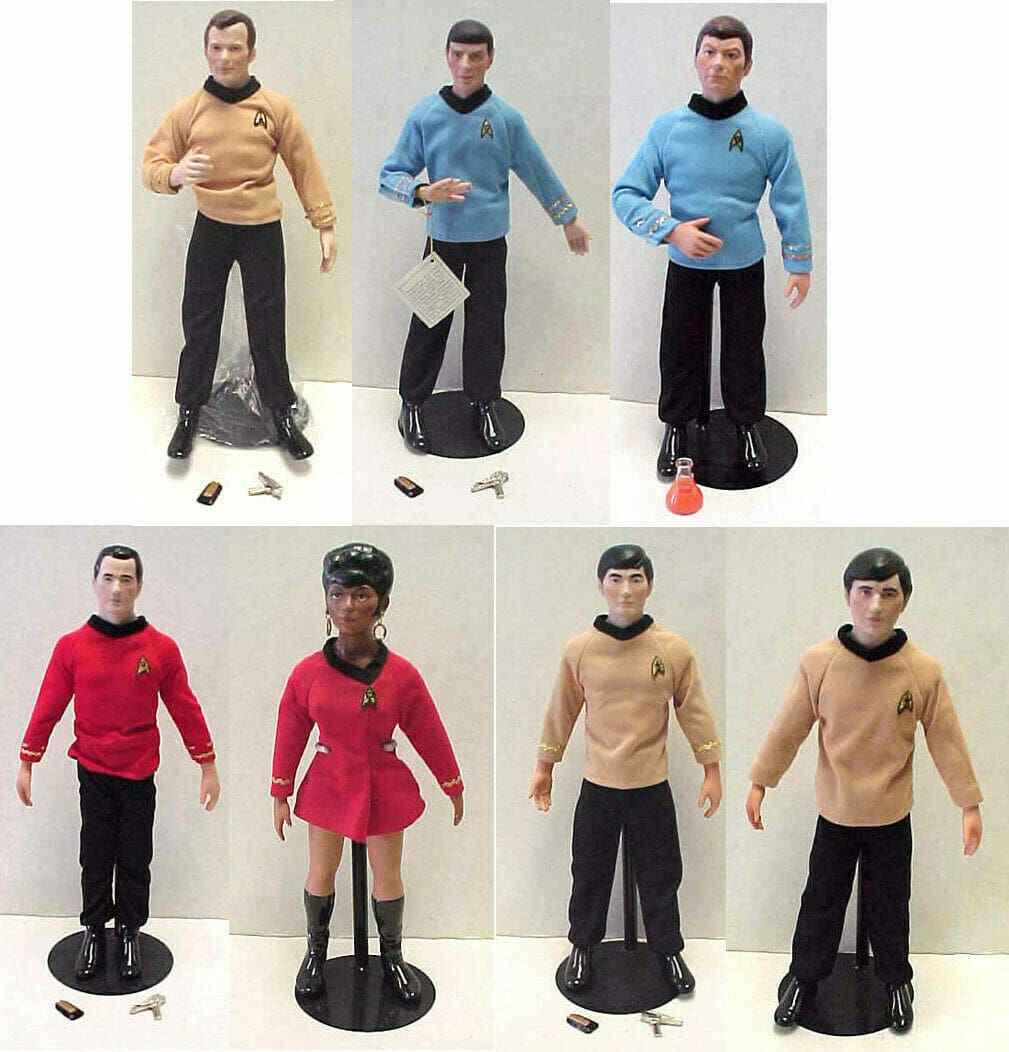 Star Trek doll collection on display stands.