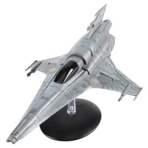 Gray and white starfighter model on stand.