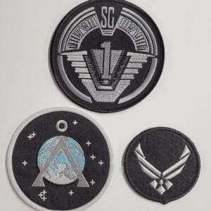 Three embroidered patches from Stargate SG-1.