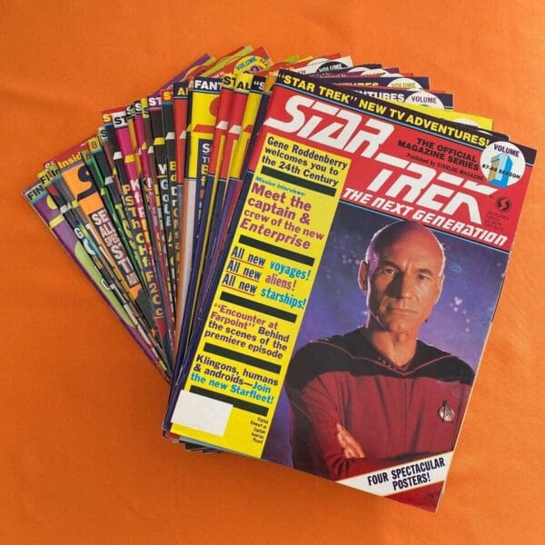 Stack of Star Trek: The Next Generation magazines.