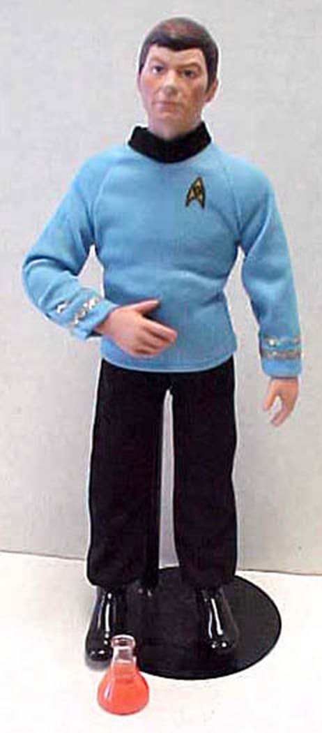 Star Trek action figure with red liquid.