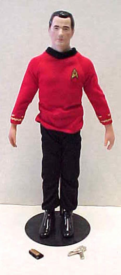 Star Trek action figure in red shirt.