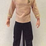 Star Trek action figure on display stand.